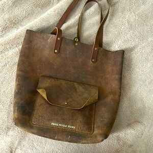 Amazing handmade genuine leather bag, meant to look distressed.